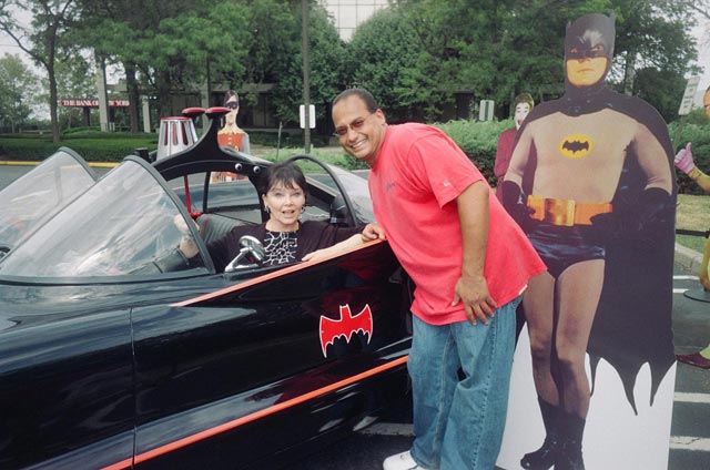 Yvonne's behind the wheel, with the proud owner (and a cutout of Adam West) by her side!