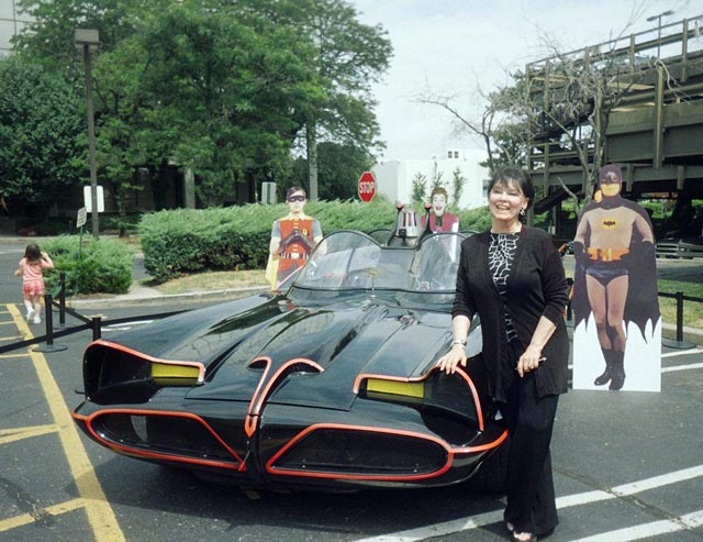 Yvonne Craig stands by the “Rock Star” Batmobile at the 2006 Super Mega Show in Secaucus, NJ.
